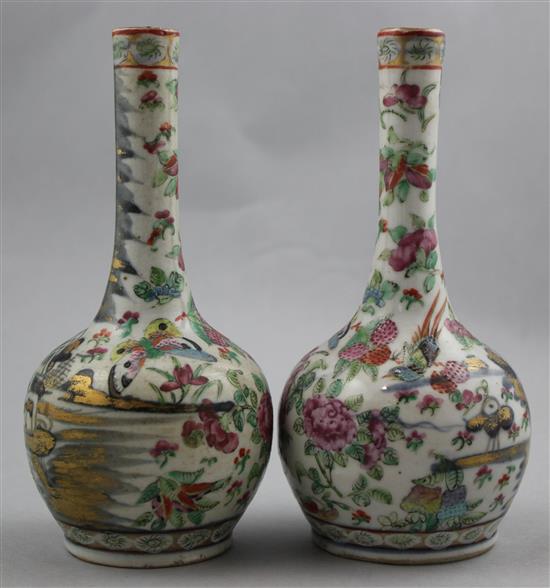 A pair of Chinese Canton-decorated small bottle vases, 19th century, 16cm